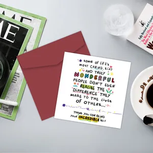 Flat lay of humorous greeting card with red envelope and colorful cute illustrations
