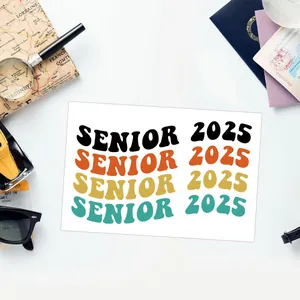 Flat lay of 2025 Senior UV transfer sticker for glass cups with vintage travel props