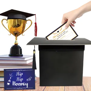 Macro shot of person inserting advice cards into a black mortarboard graduation box