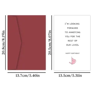 Detailed view of a funny birthday card set with burgundy envelope and creative text art