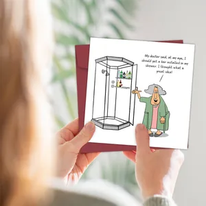 Funny birthday card with old lady wine joke and matching deep red envelope in hand