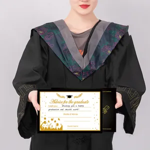 Detail of a 2025 graduate advice card held by a student in a graduation gown