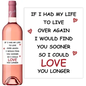 Detail of creative rose wine bottle stickers with romantic quotes and heart designs