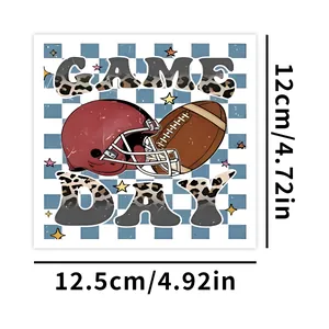 Detail van de Game Day football UV DTF transfer sticker met afmetingen van 12x12,5cm