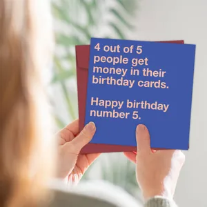 Person holding a square funny birthday card in navy blue with a red envelope