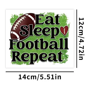 Detail van de 14x12cm Eat Sleep Football Repeat UV DTF transfersticker voor glazen