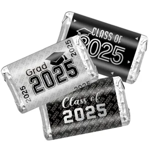 Detail of 2025 graduation candy wrappers with Grad 2025 and Class of 2025 text designs