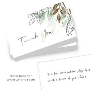 Macro detail of thank you card with floral design and blank back for handwritten notes