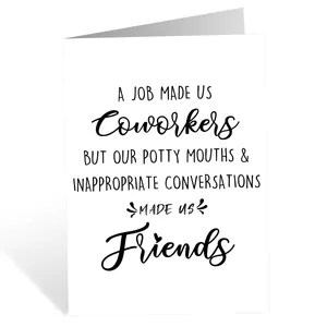 Macro view of funny white coworker birthday card with bold black typographic text print