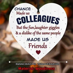 Detailed view of heart-shaped wooden plaque with inspirational friendship quote and black string