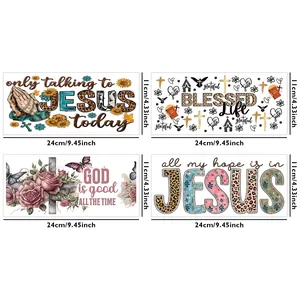 Dettagli di adesivi per trasferimento UV a tema religioso con croci e motivi floreali