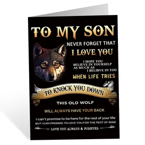 Detail view of the wolf illustration and heartfelt message on a black birthday card