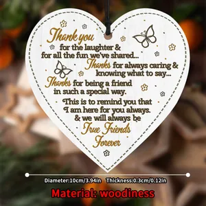Detail of wooden heart plaque featuring friendship poem and floral butterfly motifs