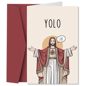 Detailed view of YOLO funny greeting card with Jesus illustration and wine red envelope