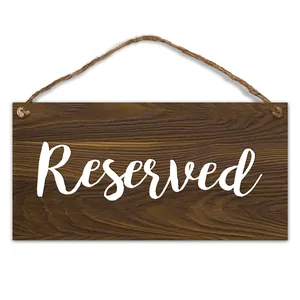 Rectangular dark brown wood Reserved sign with white script for rustic wedding decor