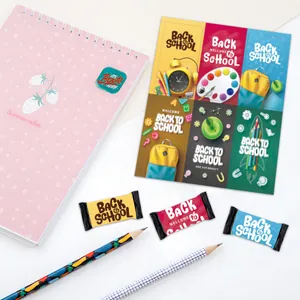 Vibrant Back to School themed stickers featuring school bags and clocks for party candy decor