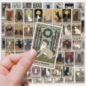 Close-up of matte cat tarot stickers with white borders for DIY laptops and skateboards