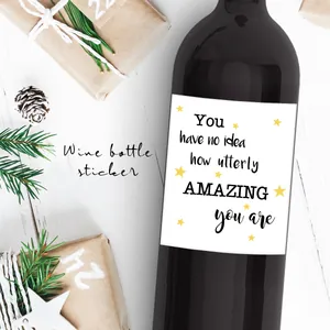 Close-up of wine bottle sticker with quote You have no idea how utterly AMAZING you are