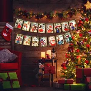 Vintage Merry Christmas banner with retro illustrations on twine for holiday party decor