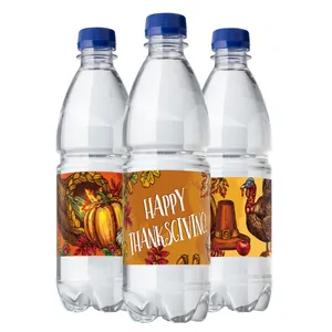 Thanksgiving water bottle labels with harvest pumpkins, turkey, and festive typography