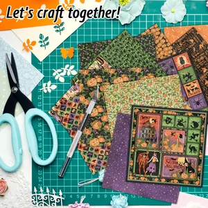 12 sheets of Halloween scrapbook paper featuring pumpkins ghosts and bats for DIY crafts