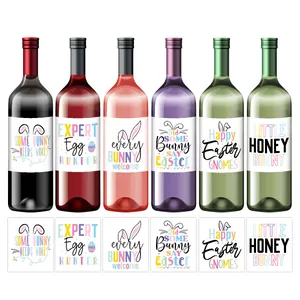 Row of six colorful Easter wine bottle stickers with festive typography and bunny motifs