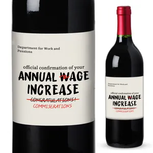 Detailed view of funny wine bottle labels with satirical DWP office design on dark glass