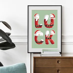 Framed Christmas wall art featuring creative LUCK typography with festive holiday elements