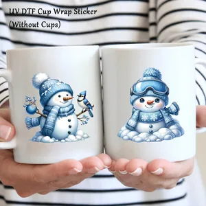 UV DTF cup wrap sticker featuring cute blue snowman designs for glass bottle decoration
