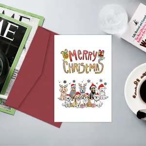 Lustiges Weihnachtskarten-Set mit Hunden in Weihnachtsmützen und rotem Umschlag