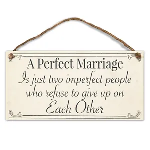 Wooden wedding anniversary hanging plaque with inspiring marriage quote and jute rope
