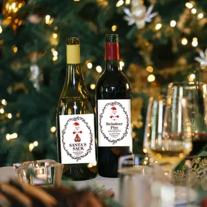 Christmas wine bottle stickers featuring Santa and Reindeer illustrations for festive decor