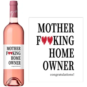 Detail of funny pink wine bottle label with Mother Fking Home Owner text for housewarming