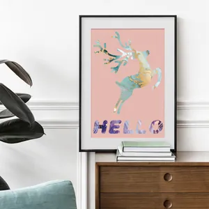 Modern marble texture reindeer poster with HELLO lettering in a sleek black frame