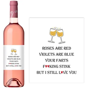 Detail of funny self-adhesive wine labels with humorous poem and wine glass illustration