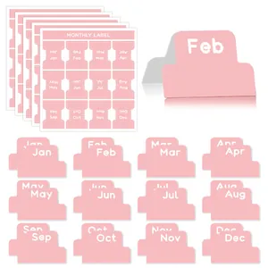 Détail des onglets d'index mensuels roses avec design pliable pour agendas et carnets
