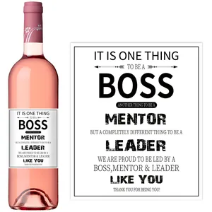 Detail of adhesive wine bottle label featuring Boss Mentor Leader motivational text