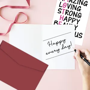 Detailed view of handmade Mother's Day greeting card set with burgundy envelope and ribbon