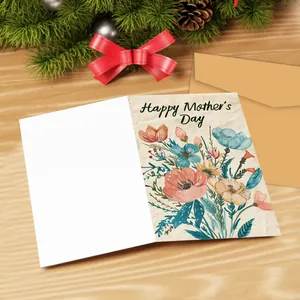 Floral Happy Mother's Day card with kraft envelope on light wood background