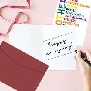 Close-up of a Mother's Day greeting card set with a burgundy envelope and ribbon decor