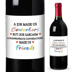Close-up of funny coworker wine label sticker on a dark glass bottle with red seal