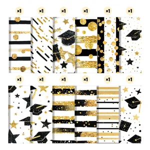 12-piece black and gold graduation scrapbook paper with glitter cap and star patterns