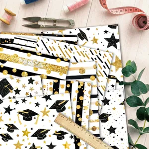 12-pack graduation scrapbook paper with gold glitter graduation cap and star patterns