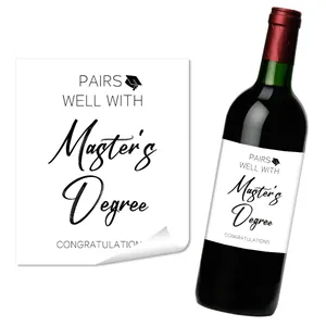 Detail of Master's Degree graduation wine labels with elegant black script and cap