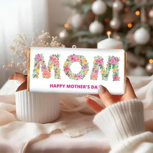Detail of floral HAPPY MOTHER'S DAY sticker labels on mini chocolate bar wrappers