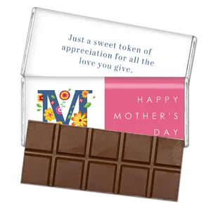 Detailed top view of a 12-square chocolate bar with floral Mother’s Day gift packaging
