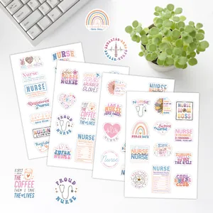 Macaron nurse themed stickers with stethoscope and heart designs on a white keyboard