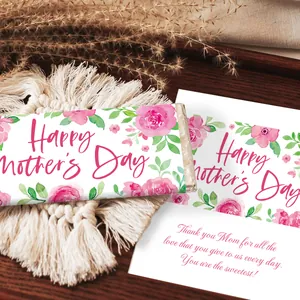 Detail of Mother's Day chocolate wrappers with pink watercolor floral patterns on paper