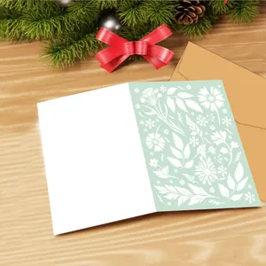 Set of watercolor wildflower greeting cards with natural kraft paper envelopes on wood