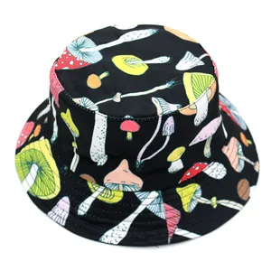 Close-up of vibrant mushroom print and neat stitching on black reversible bucket hat